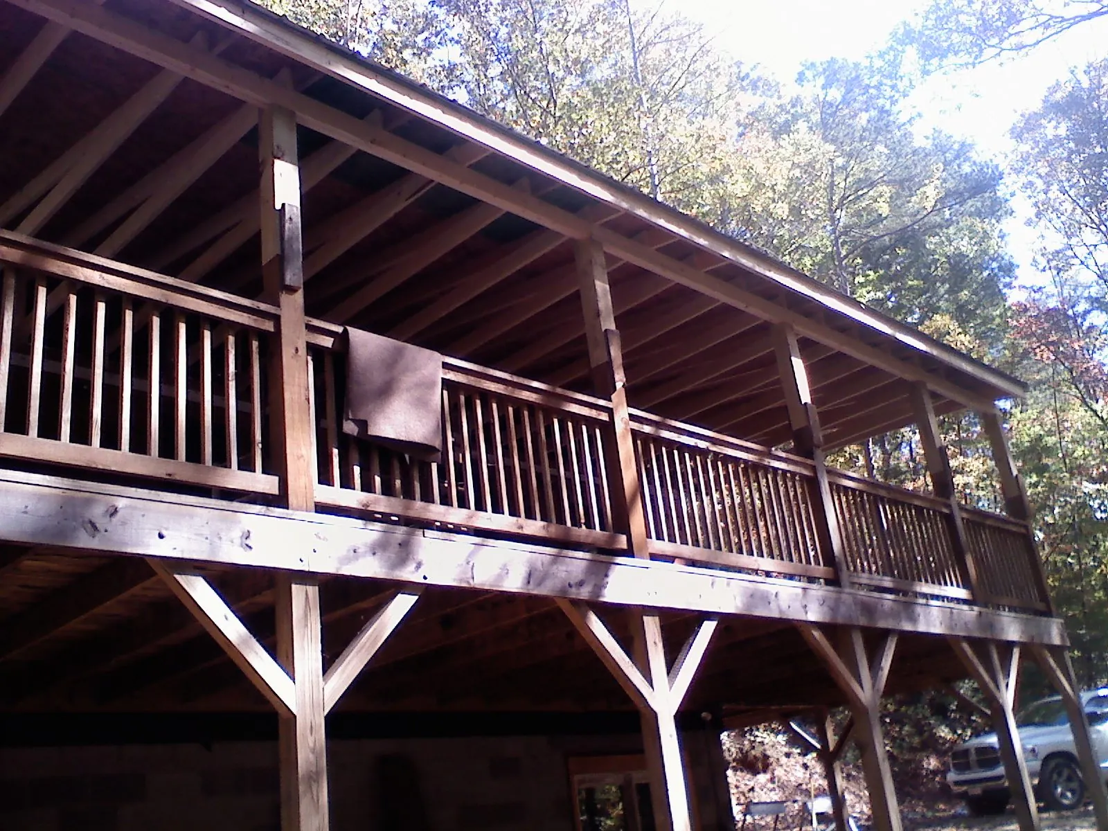 Timber framing under a new elevated porch and deck — Roof Leak Repair in South Lancaster by Roofing Brothers